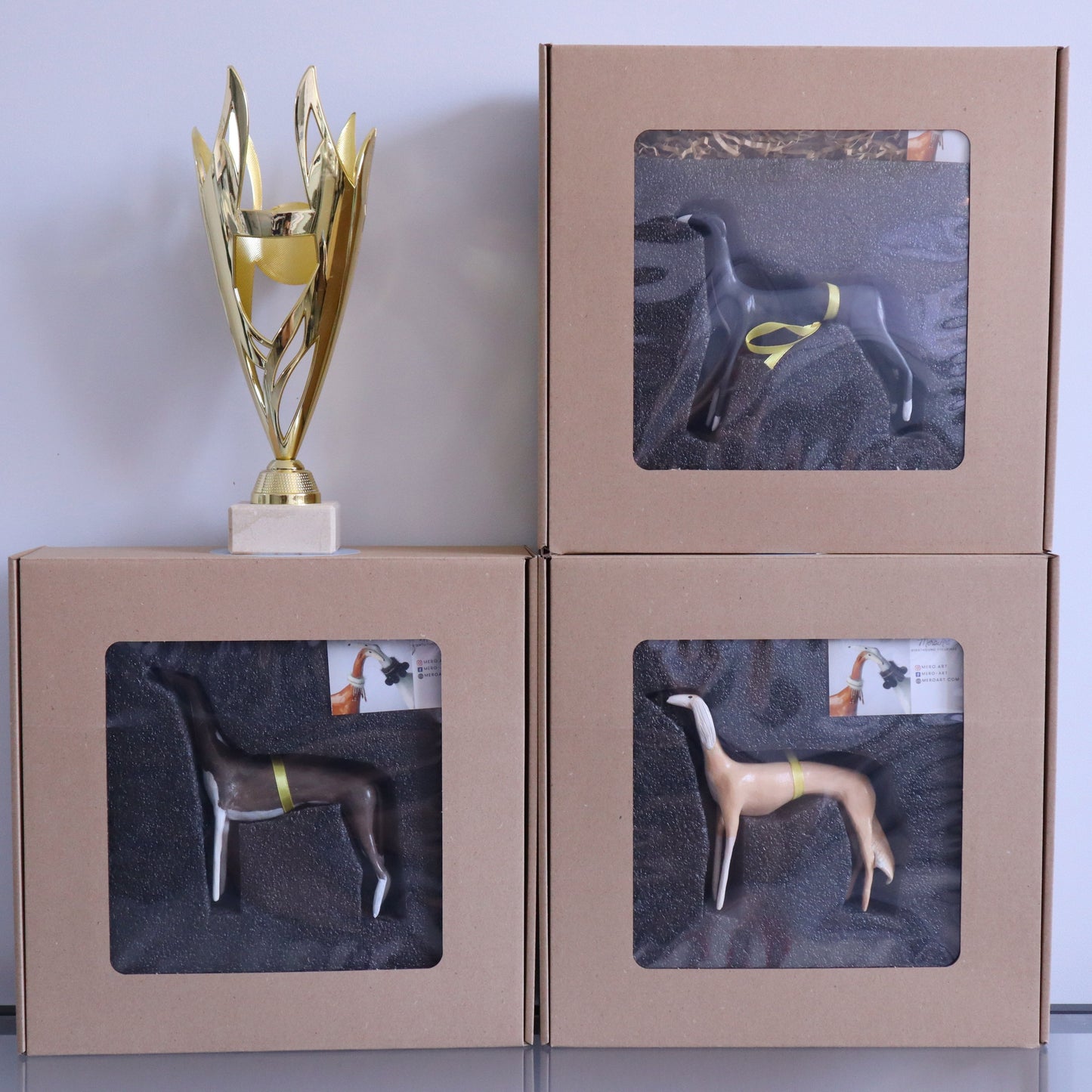 Beautiful cardboard box with display shows off your figurine.